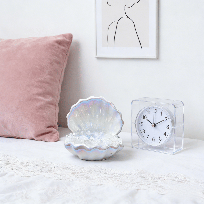 Natural crystal seashell table lamp on bedside table